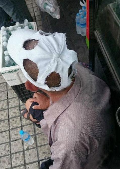 大叔的帽子有着强大的散热功能 大叔的帽子有着强大的散热功能